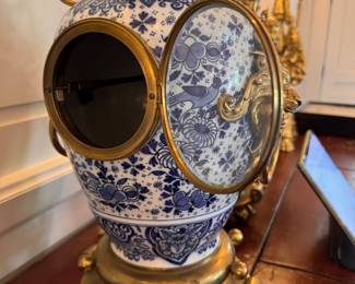 Three-Piece Delft Blue & White Porcelain & Gilt Bronze Garniture Set. Clock Measures 24" H & Candelabras Measures 28" H.  Photo 4 of 7. 