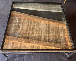 Chrome and Smoked Mirrored Glass Cocktail Table with Lacquered Ebony Raised Edge Trim. Measures 48" x 48" x 20" H. Photo 3 of 4. 