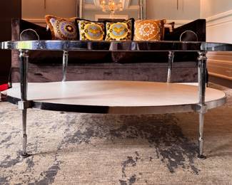 Two-Tiered Chrome and Glass Oval Coffee Table - 2 Available. Each Measures 48" x 30" x 18.5" H. Photo 1 of 5.  