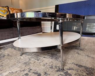 Two-Tiered Chrome and Glass Oval Coffee Table - 2 Available. Each Measures 48" x 30" x 18.5" H. Photo 2 of 5. 