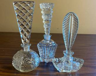 p Set of Three Vintage Decorative Glass Perfume Bottles with Intricate Elongated Stoppers H 7.5in and 6.5in