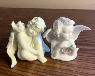 k Set of Two White Porcelain Cherub Figurines with Detailed Wings and Doves