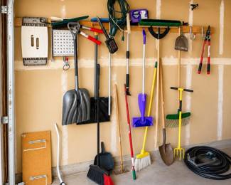 g large assortment of garden, home and yard tools.