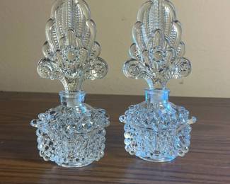 p Pair of Clear Glass Hobnail Styled Perfume Bottles with Ornate Floral Stoppers 7in