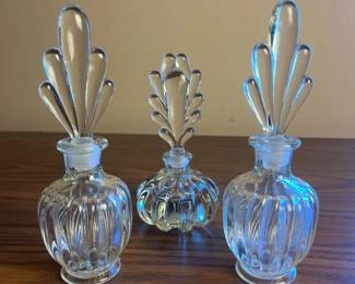 p Set of Three Vintage Clear Glass Perfume Bottles with Ornate Stoppers H 8in and 7in