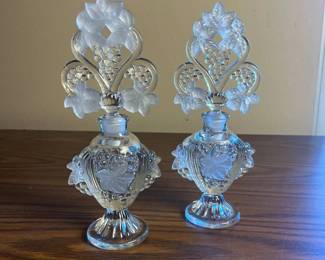 p Pair of Vintage Etched Glass Perfume Bottles with Intricate Floral Stoppers H 10in
