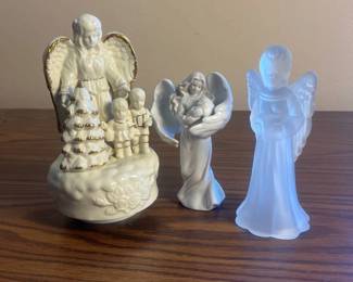 k Collection of Three Decorative Angel Figurines Featuring Porcelain and Frosted Glass