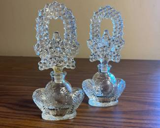 p Pair of Intricately Designed Clear Glass Perfume Bottles with Decorative Hobnail Stoppers