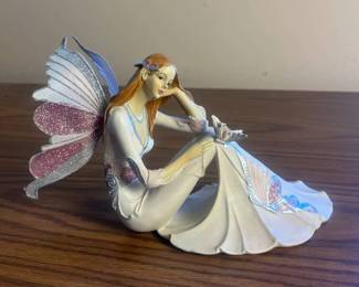 k Delicate Fairy Figurine with Glittered Wings and Flowing Dress