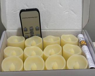 (12) Remote Batt Operated Tea Lights,   $9