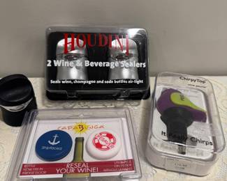 Six (6) Misc. Wine Stoppers,   $8