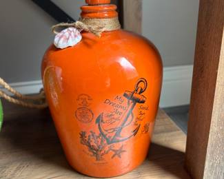 Orange jar "My dreams are made of sun, sand, and sea", 9"H,  $15