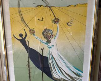 This framed print is "Dream Passage" (also known as Daphne I), a color lithograph created by Spanish Surrealist artist Salvador DalĂ in 1979