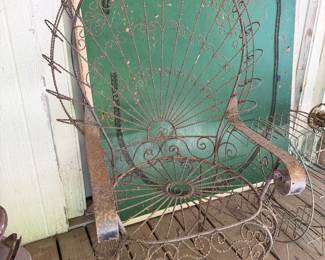 rusty metal peacock chair