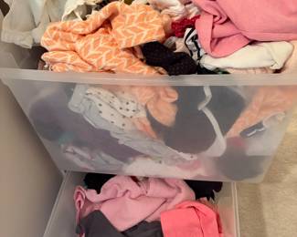 Totes filled with high end children's clothing 
