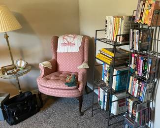 Small wing bag, chair, side table, CDs, DVDs, books