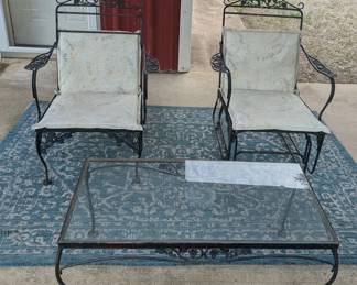 Outdoor wrought iron chairs, table and rug