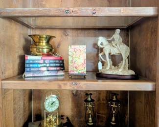 Sculpture, brass, clock, books