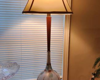 Vintage Stiffel brass lamp with a slender column base and a decorative ceramic body