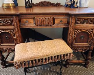 Antique Jacobean desk with intricate carved panels