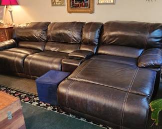  Dark brown leather sectional sofa with a chaise lounge