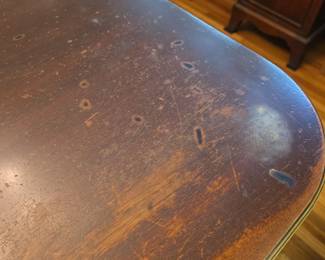 Photos of finish wear on table - as it will be covered with the pad during the sale