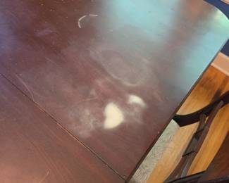 Photos of finish wear on table - as it will be covered with the pad during the sale
