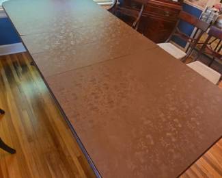 Table with pad on it. Pad included for 2 of the 3 leaves