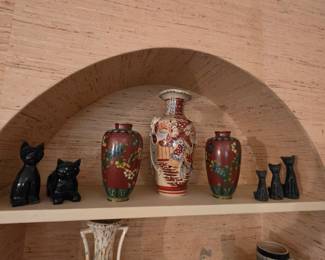 Vases and cat figurines