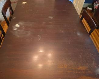 Photos of finish wear on table - as it will be covered with the pad during the sale