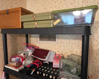 Sewing boxes, thread, glue guns and other arts and crafts