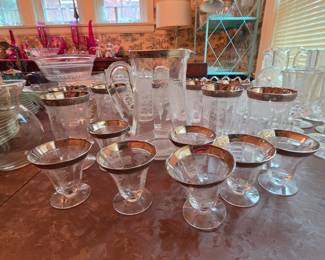 Silver plated rimmed glasses and pitcher set