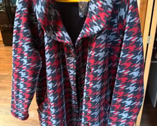 Women’s Red, Black & Gray Houndstooth Coat Women’s patterned coat featuring a bold red, black and gray houndstooth-style design. Button-front closure with wide collar and long sleeves. Soft, cozy fabric with a classic statement look. Pre-owned condition; see photos for details. Brand and size not confirmed.
