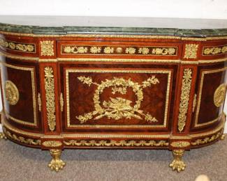Lousi XVI Style Marquetry with gobs of Ormolu Brass paw feet, with rounded doors and draWERS. The marble top is not a perfect fit. 39"T x 16" w x 20" d.