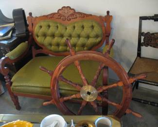settee and ships wheel 
