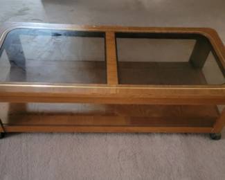 Oak Coffee Table with rollers on the bottom