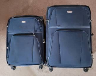 2 Matching Roller Suitcases Samsonite