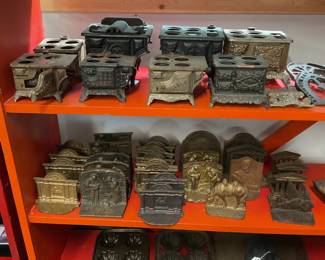 Cast Iron on this orange shelving is $5 each piece except Boot Scraper.  