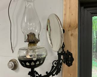 Mercury glass reflector makes this wall lamp so special