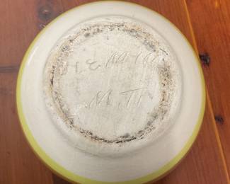 Bottom of Native American bowl: We're not sure what this says..