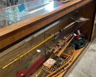 Super nice display case; snowshoes; fishing items; driftwood decor