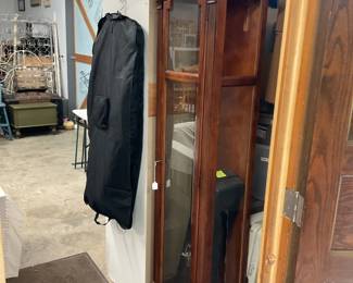Gun cabinet or great display if shelves were added.