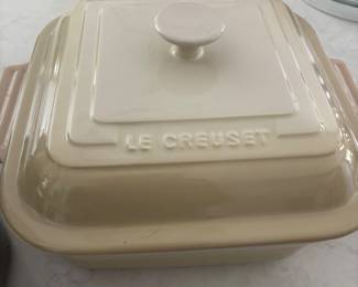 Le Creuset Heritage Covered Casserole Beautiful Le Creuset Heritage square casserole dish in a classic cream/ivory finish with matching lid. Excellent for baking, serving and entertaining