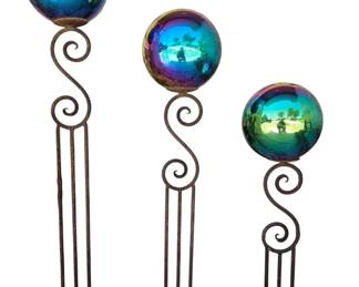 Trio of Iridescent Rainbow Gazing Globes on Rustic Iron Scroll Pedestals