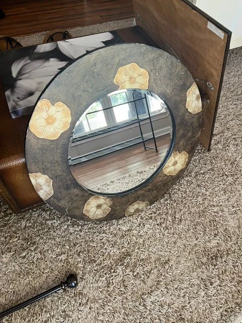 ROUND DECORATIVE MIRROR WITH FLORAL DESIGN $40