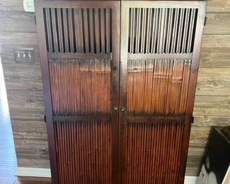 LARGE CARVED WOOD ARMOIRE/CABINET $150