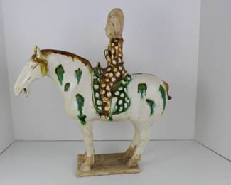 Tang Dynasty style horse and rider with sancai glaze.