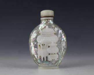 Mother of pearl Chinese or Japanese snuff bottle with the hundred objects theme.