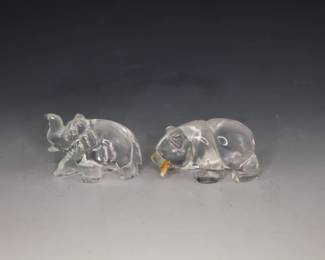 Rock crystal figurines of an elephant and bear carrying a fish