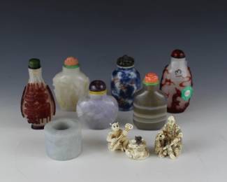 Huge selection of Chinese snuff bottles, Chinese Archer Rings/Thumb Rings and other small Asian art items.